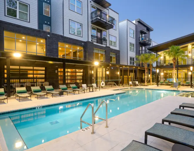 an outdoor resort-style swimming pool